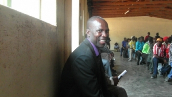 A happy delegate after stakeholders had agreed on conflict resolutions